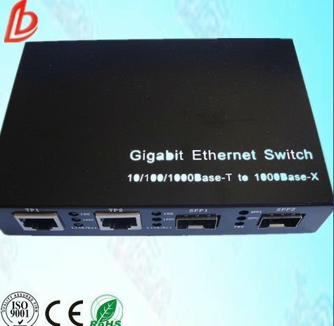 Four ports 10/100/1000M Ethernet Switch with two 10/100/1000M UTP ports and two 1000M SFP sockets